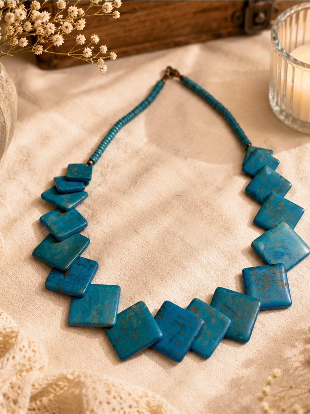 Venice Blue Bone necklace features polished square artificial bone overlap